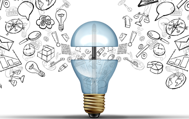 Business innovation ideas concept as an open light bulb with financial and office icons being released as a communication success symbol for marketing strategy solutions.
