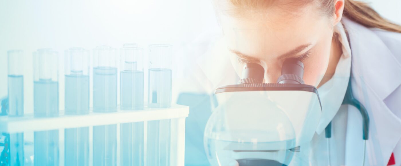 Doctor with microscope