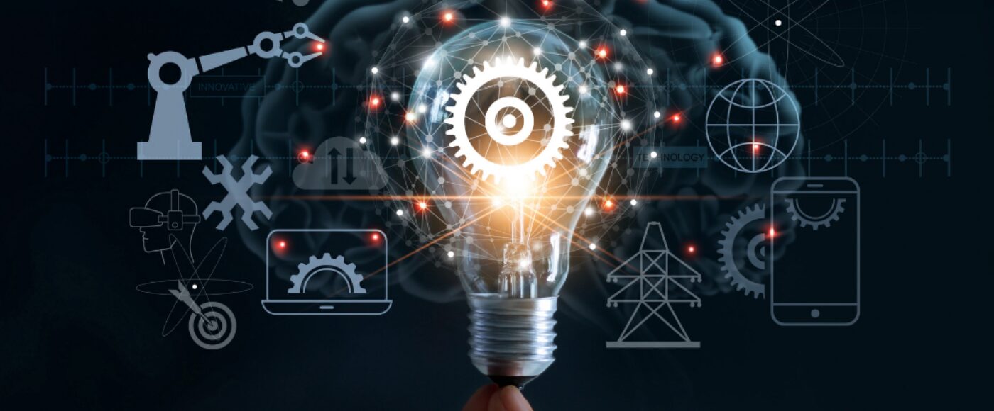 Hand holding lightbulb with cog inside and innovation icon network connection on brain background, innovation technology in science and industrial concept