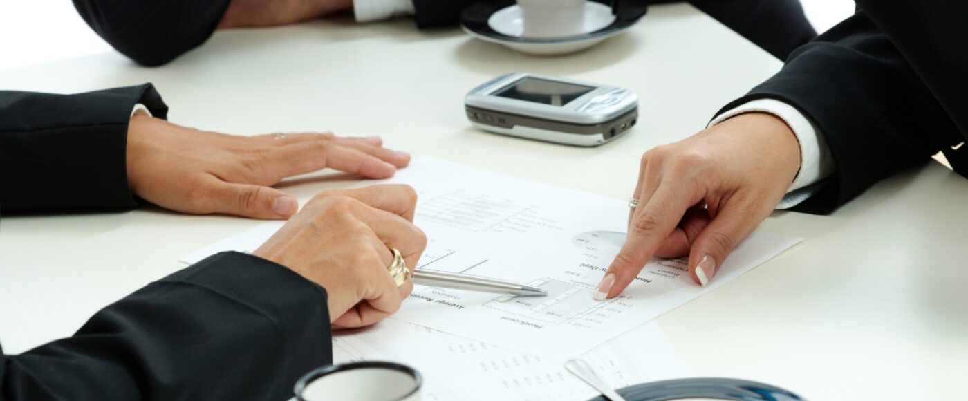 Hands Pointing Business Chart