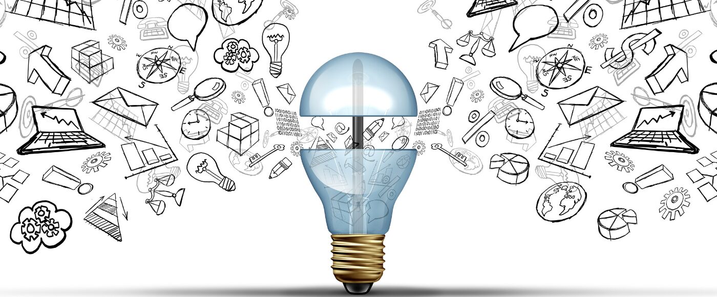 Business innovation ideas concept as an open light bulb with financial and office icons being released as a communication success symbol for marketing strategy solutions.