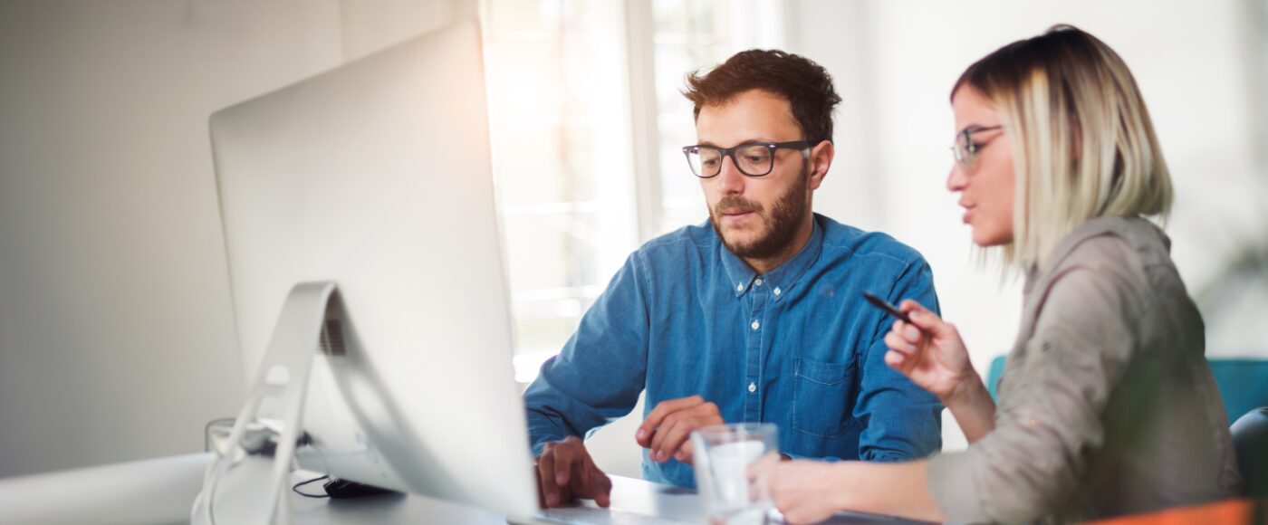 Small business owners on laptop