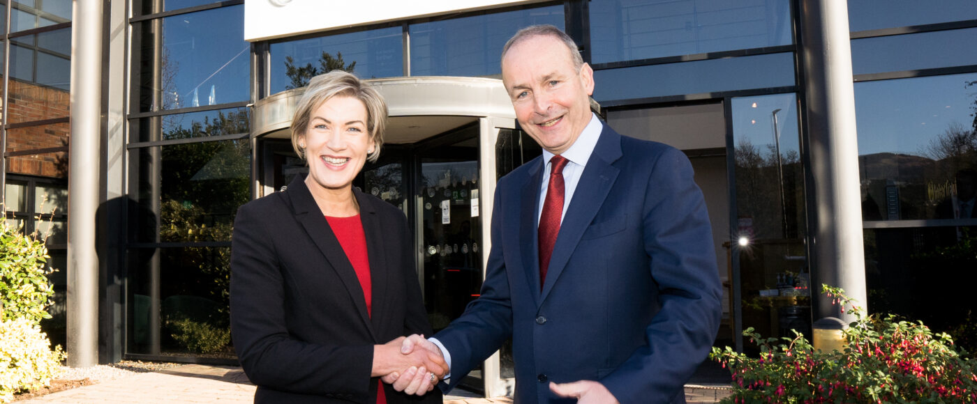 CEO Margaret Hearty shaking hands with Taoiseach Micheál Martin outside Inter Trade Ireland
