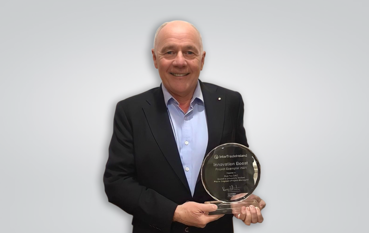 Joe English holding his award landscape thumbnail