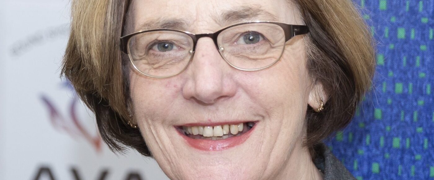AVA Odilon at desk with glasses cropped